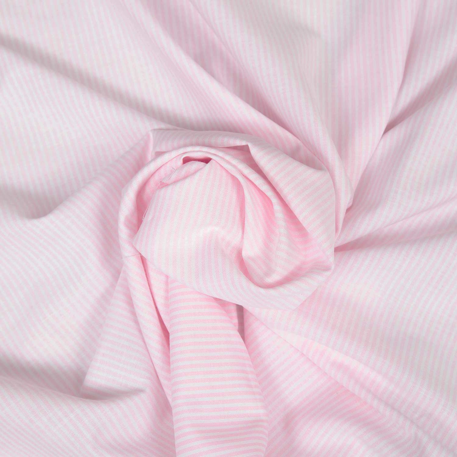 Tessuto in cotone panama tinta a filo rosa con bastoncino verticale e finissaggio washed, Made in Italy
