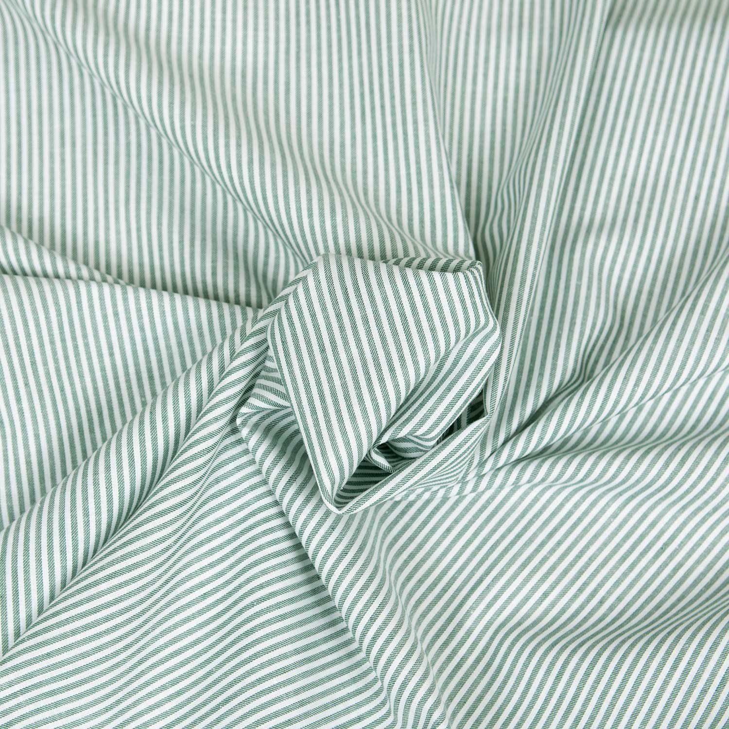 Tessuto panama in 100% cotone washed verde con righe verticali a contrasto, fresco e morbido