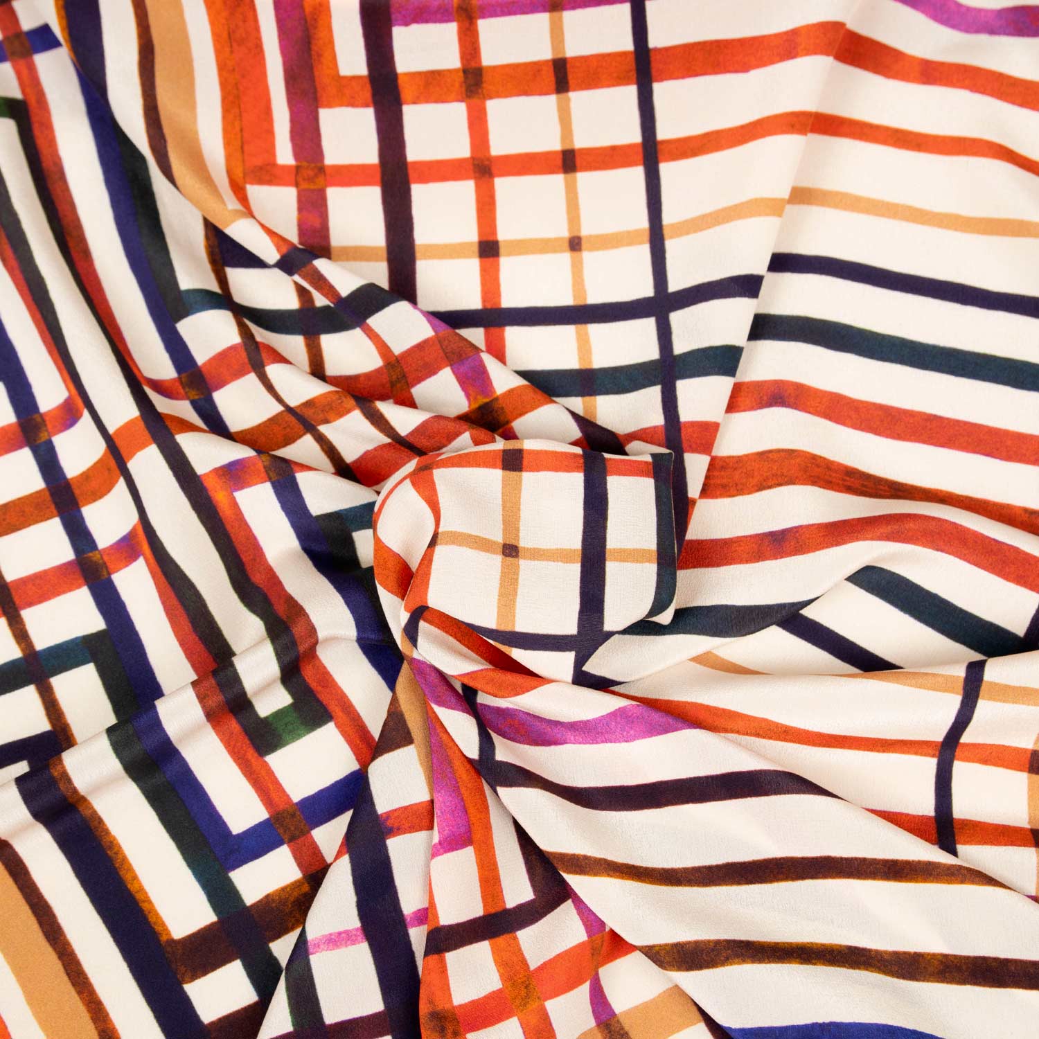 Stoffa deadstock seta crêpe de chine pattern geometrico multicolore griglia irregolare fondo bianco acquista online tessuti pregiati al metro