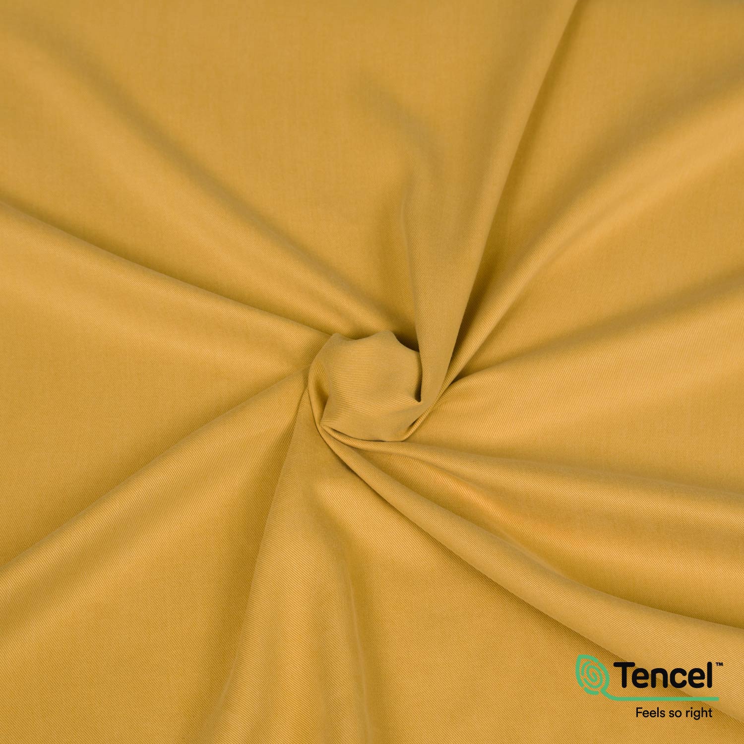 Tessuto twill in Tencel™ morbido e sostenibile, con drappeggio fluido, fibra ecologica dall’eucalipto, ideale per gonne, camicie, vestiti, pantaloni, completi. Color giallo