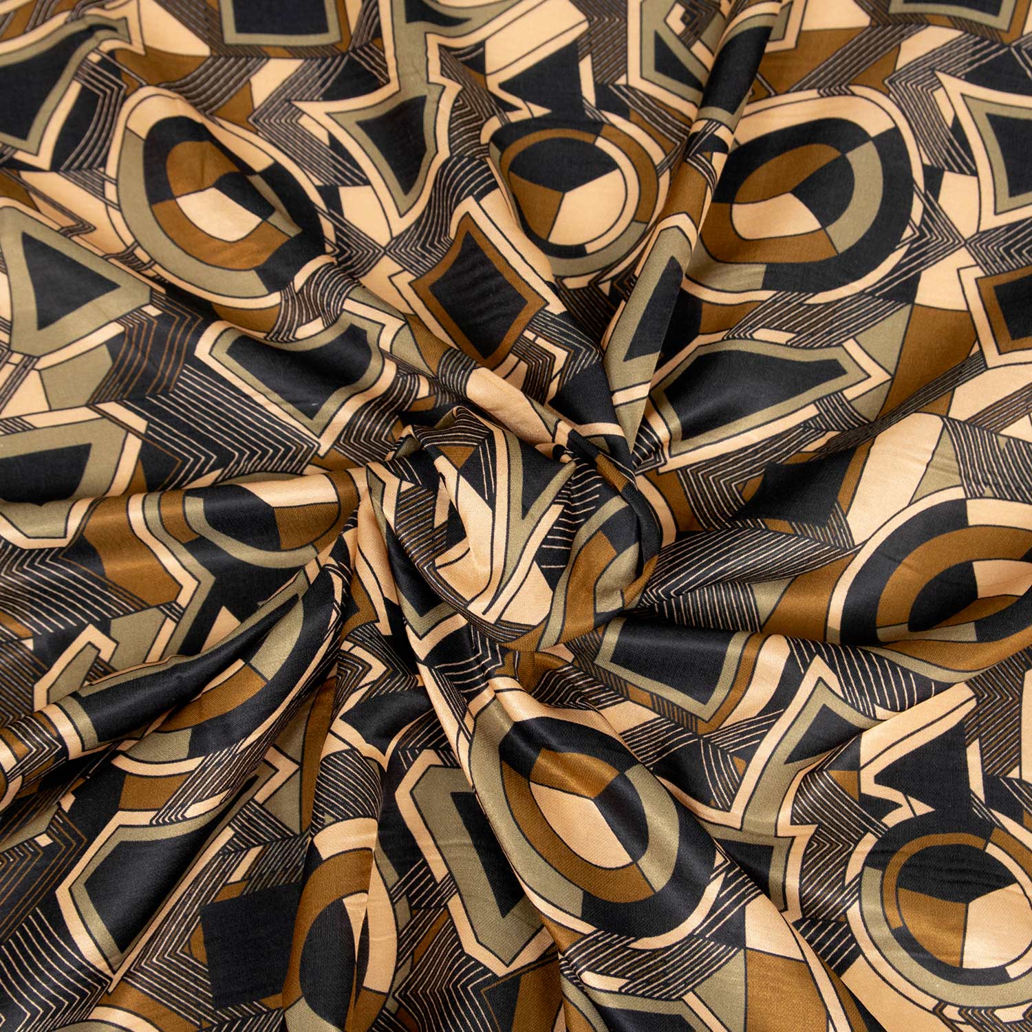 Tessuto charmeuse in raso leggero 70% cotone 30% seta con stampa geometrica optical nei toni caldi del marrone, stoffa da abbigliamento deadstock made in Italy, venduta al metro.