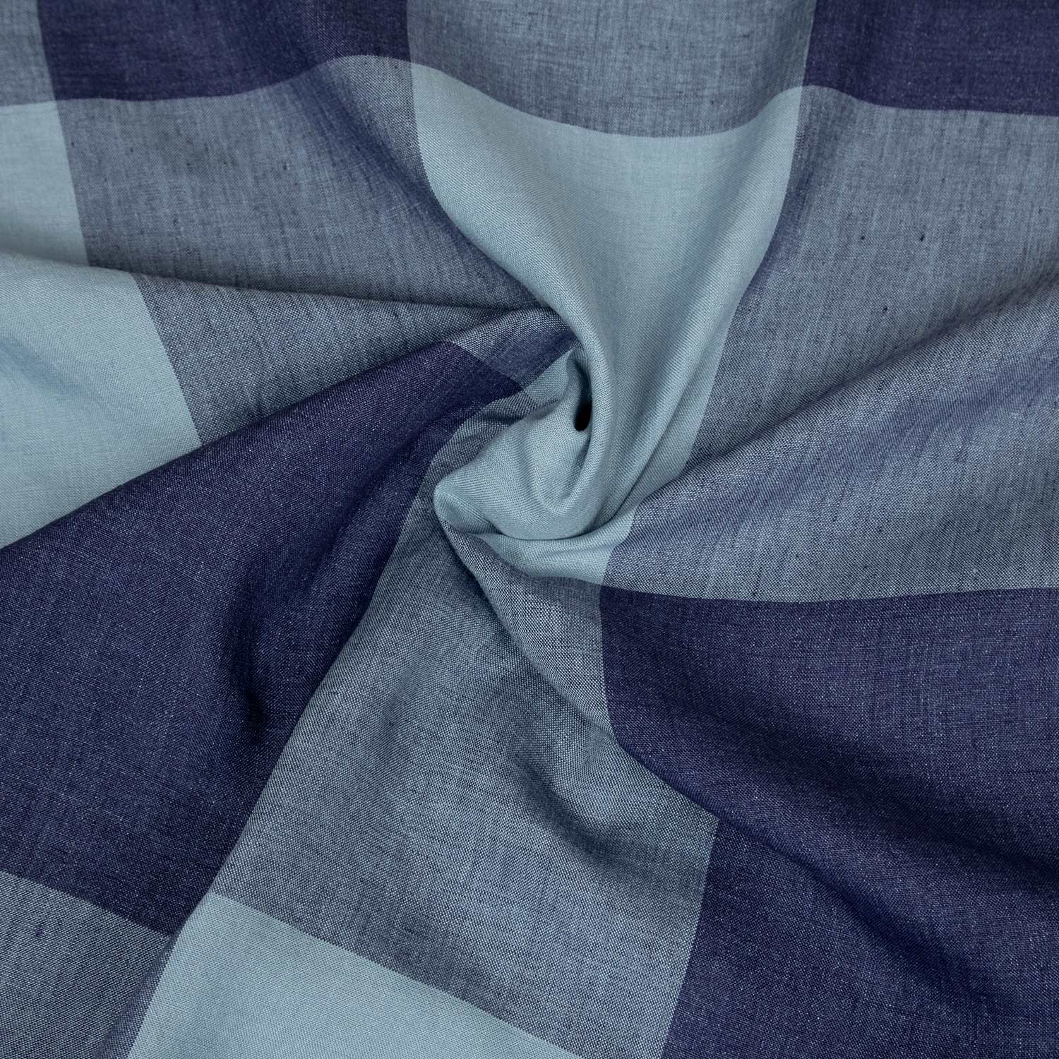 tessuto in puro lino made in italy a quadri sui toni del blu e celeste, una stoffa deadstock venduta al metro ideale per realizzare abiti, vestiti, camicie o pantaloni