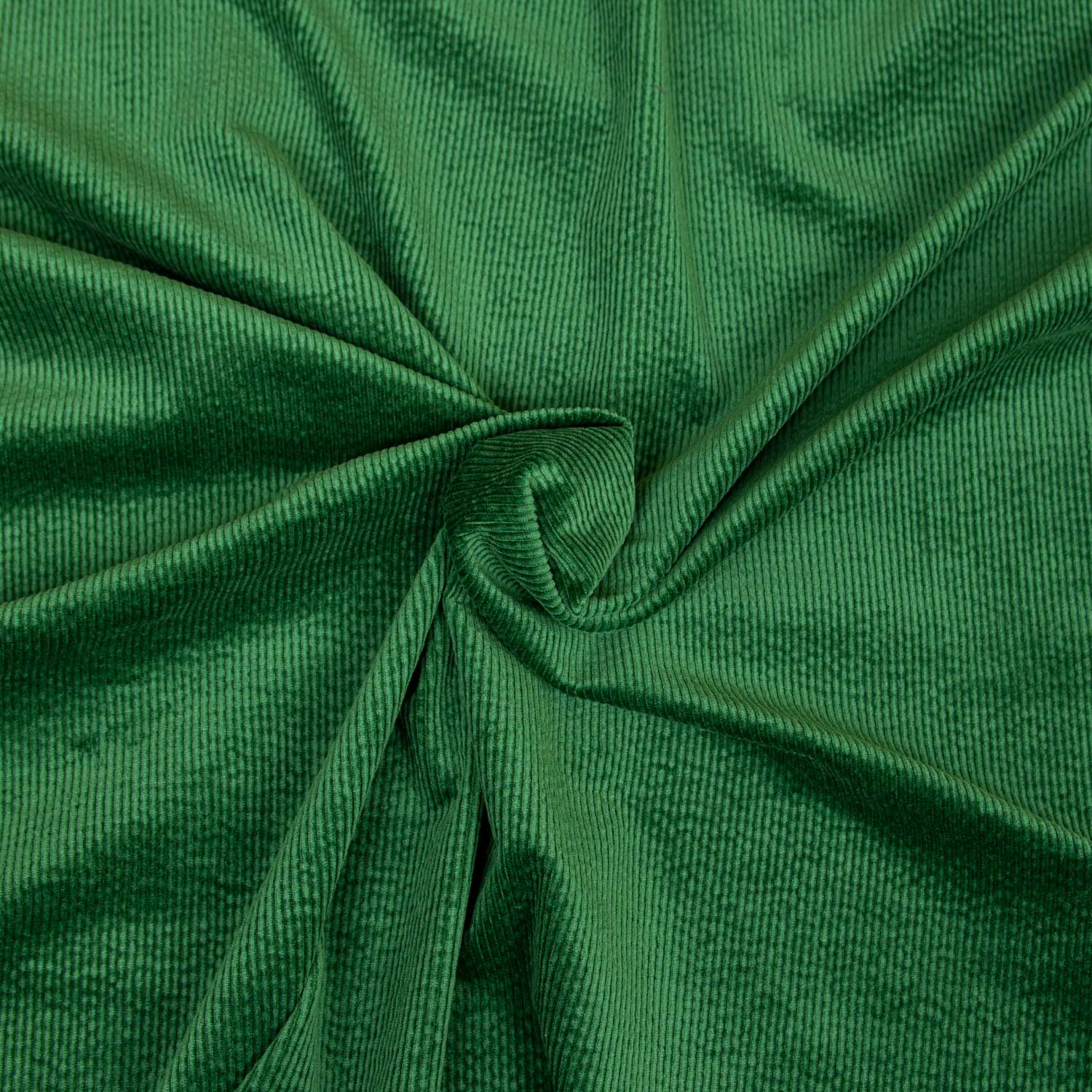 Tessuto in velluto a coste 500 righe morbido e di qualità. Una stoffa in cotone, modal ed elastane venduta al metro e sempre disponibile in grandi quantità; colore verde brillante